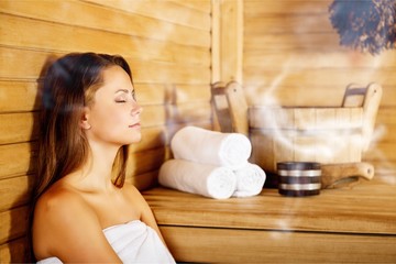 Young woman relaxing in spa