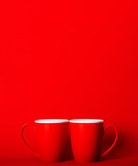 A cup of fragrant coffee on a red background for your design. Advertising coffee.