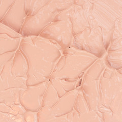 Texture of foundation for face. Face foundation. Smears of facial toning cream.