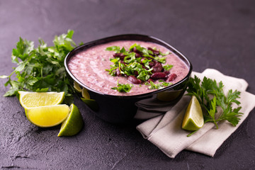 Mexican red bean puree soup with lime, parsley and chilli pepper.