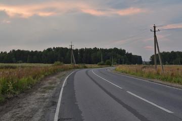 Landscape road at sunset
