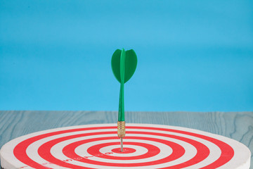 Dart arrow on target dartboard ,Business success concept.