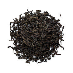 Heap of dried black tea leaves isolated on white background. Top view.