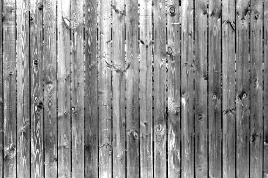 Old wooden fence in black and white.