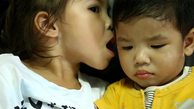 Thai children playing  smartphone 