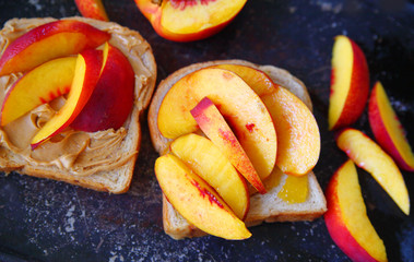 Sandwich of peanut butter and nectarines