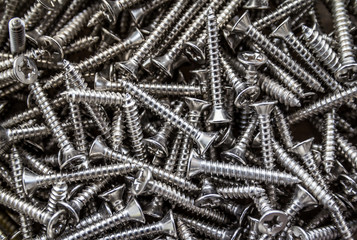 Closeup of steel screws background