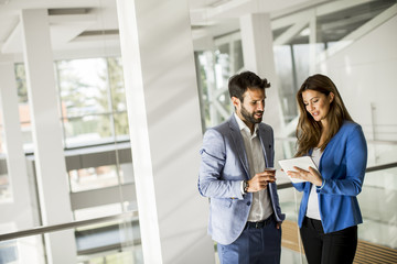 Young business people standing in the office