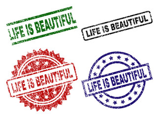 LIFE IS BEAUTIFUL seal prints with distress texture. Black, green,red,blue vector rubber prints of LIFE IS BEAUTIFUL text with unclean texture. Rubber seals with circle, rectangle, medal shapes.