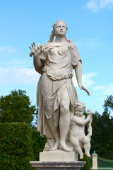 ancient sculptures in the summer park