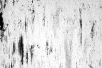 Grungy rusted metal surface in black and white.