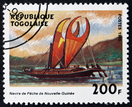 Postage stamp Togo 1999 New Guinea Fishing Boat