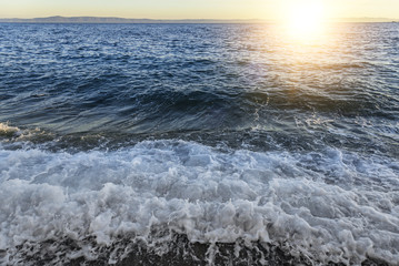 The sea surf. Uneasy waves of the sea shore.