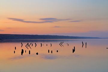Evening sky above the mirror surface of the estuary.