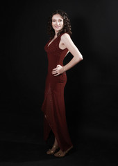 beautiful woman in red dress with evening make-up