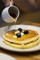 Buttermilk Pancakes with Poured Maple Syrup