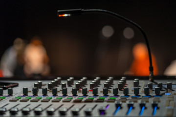 Mixer with stage in the background