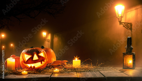 Scary horror background with halloween pumpkin jack o lantern