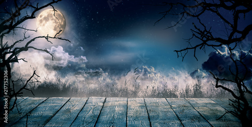 Scary horror background with empty wooden deck