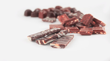 close up.a set of chocolate bars and sweets. isolated on white.p