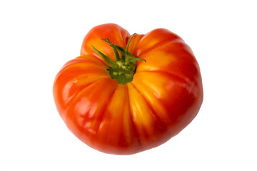 A fresh red ripe tomato isolated on white background. Concept health.