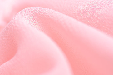 Pink fabric material texture macro blur background