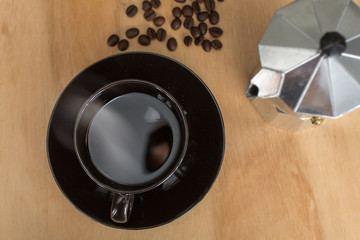 coffee coka concept. Moka coffee drip from steaming on the table. Coffee bean. Black coffee.