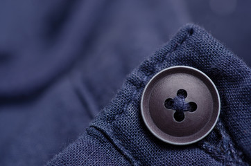 Blue fabric material texture button macro blur background © Kabardins photo
