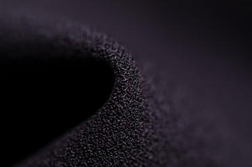Black fabric material texture macro blur background