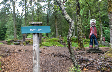 Wooden troll figures carved our of wood at Trollskogen forested area in Bergen, Norway. © Roman Tiraspolsky