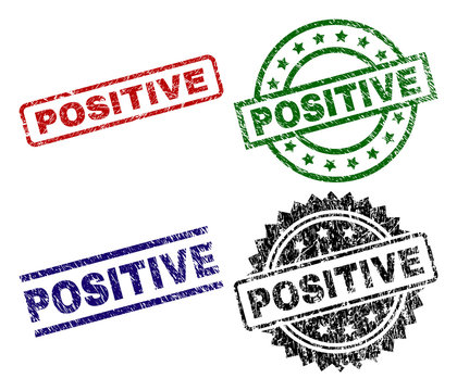 POSITIVE seal prints with distress surface. Black, green,red,blue vector rubber prints of POSITIVE title with grunge surface. Rubber seals with round, rectangle, medallion shapes.
