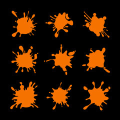 Splashes of orange juice. Vector pictures isolate