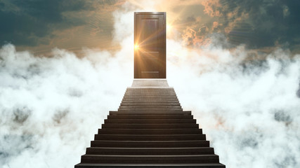 Closed door on the stairs at the top on the clouds, sunlight, magic