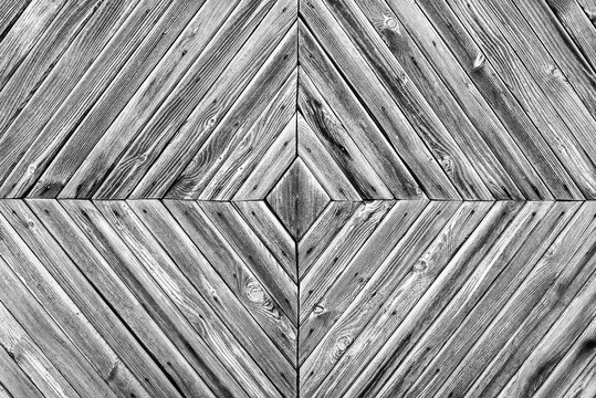 A diamond-shaped pattern of the old wooden boards,black and wite background