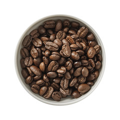 Dry coffee beans in bowl. Preparing ingredients for cooking. Isolated on white background. Top view.