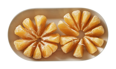 Tangerine on plate. Preparing ingredients for cooking. Isolated on white background. Top view.