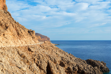 Fototapeta na wymiar rocky road along the sea to the Balos beach, Crete, Greece
