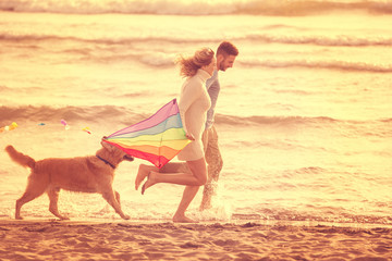 Fototapeta na wymiar happy couple enjoying time together at beach