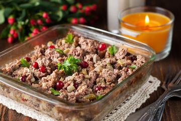 Ground meat stewed with apples, cranberries, herbs