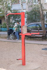 Exercise equipment in a public park in a sunny day