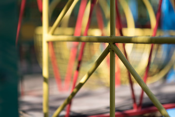 Fototapeta na wymiar Colorful rope bridge in children adventure amusement park