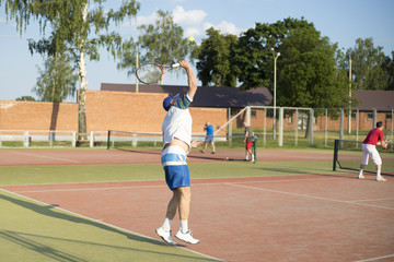 Obraz premium Tennis player plays the ball after filing. Tennis competition.