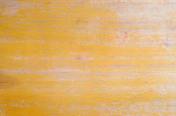 Texture of old weathered plywood furniture with peeled varnish, cracked from time and weather. Old Plywood background