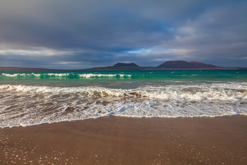 Beautiful landscape of beach and sea in volcanic island Lanzarote