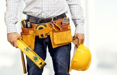 Fototapeta na wymiar Worker with a tool belt