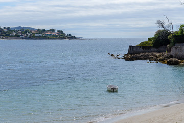boat on the water, view from the beach
