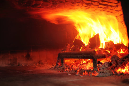 Fire Wood Burning In The Oven