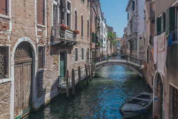 Fototapeta na wymiar Canal and Houses of Venice, Italy