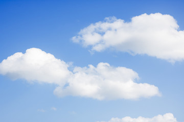 Naklejka na ściany i meble blue sky, covered with white clouds on a warm summer day