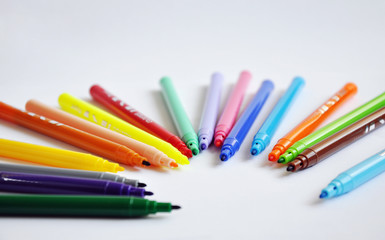 a lot of colorful markers for school